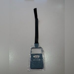 Gucci Guilty Bookmark or Nag Charm with ribbon and metal GG logo.